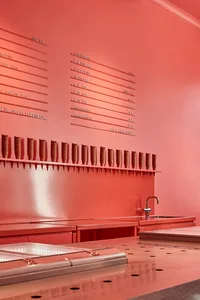 Coral pink-colored retail space with ice cream cones on display