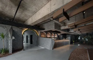 Concrete walls and ceiling of a restaurant bar interior