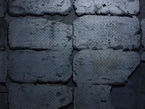 Industrial-style concrete tiles on a wall
