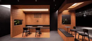 Modern cafe interior with wooden paneling, black chairs, and green potted plant