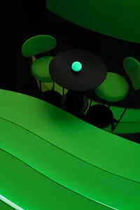 Modern industrial restaurant interior with neon accents and table setup.