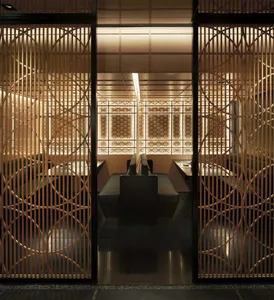 Interior of a minimalist restaurant featuring wooden elements and a modern design.