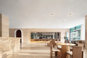 Industrial restaurant with marble and wooden materials