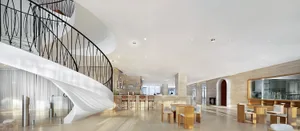 A modern hotel bar with concrete walls and glass elements.