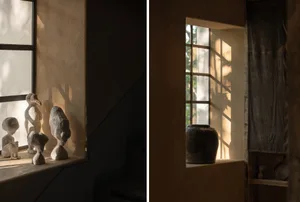 Ceramic sculptures displayed on a windowsill with shadow patterns cast across the wall.