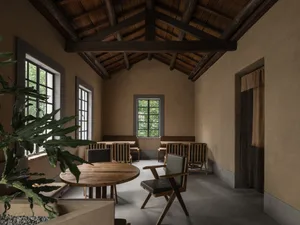 A minimalist coffee shop interior featuring wooden furniture and materials.