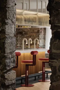 Modern bar interior with stools and counter