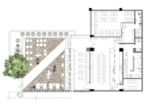 A detailed floor plan of a modern office space with stone flooring and various office furniture.
