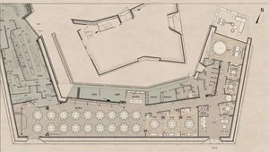 Floor plan of a restaurant with seating arrangements and functional zones.