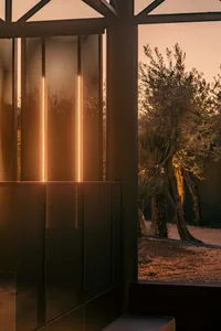 A minimalist outdoor space featuring metallic elements