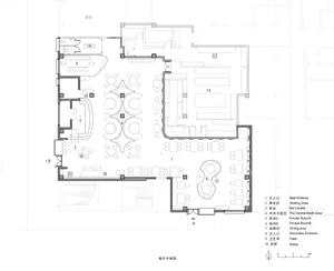 Floor plan of a restaurant dining area with neutral materials and furniture arrangements.