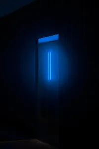 Blue neon lighting in a minimalist interior space.