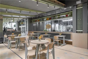 Modern coffee shop interior with contemporary design elements.