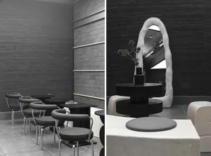 Modern cafe seating and tables with black and white concrete and metal materials