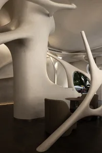 Modern restaurant interior with concrete and steel features