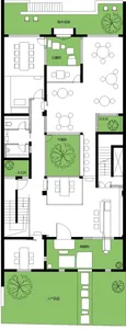 An architectural floor plan depicting a house with green landscaping.