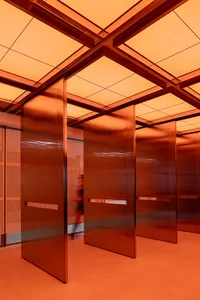 Modern interior with metallic walls and glass panels