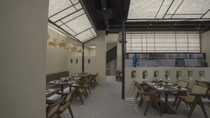 Modern restaurant interior designed with contemporary materials.