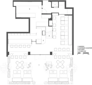 Floor plan of a minimalist coffee shop interior with seating areas, a bar counter, and a kitchen.