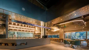 Interior design of a modern coffee bar featuring metallic sheets