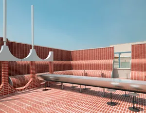 Modern, minimalist outdoor lounge area with brick walls and stainless steel benches.