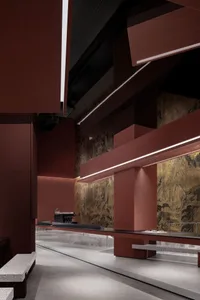 A modern coffee shop interior featuring marble and wood elements.
