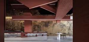 A modern coffee shop with metallic sheet walls and a sleek, minimalist design.