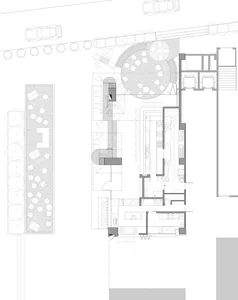 Floor plan of a modern restaurant featuring metal and glass elements.