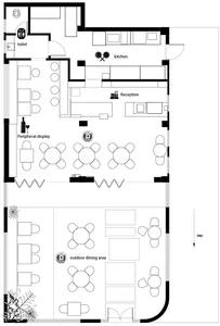 Floor plan of a restaurant interior design showcasing tables, chairs, and kitchen layout.