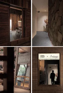 A modern, industrial interior featuring natural wood and stone materials.