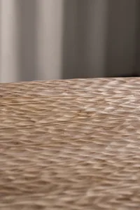 A close-up of a modern laminate texture wood surface