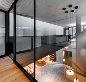 A modern retail space featuring concrete walls, wooden accents, and glass elements.