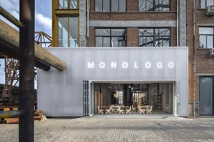 Modern coffee shop with metal-clad exterior and industrial design elements