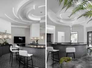 Modern coffee shop interior with white terrazzo countertops and white seating.