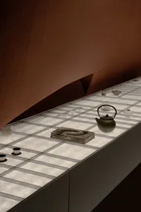 Minimalist tea table featuring ceramic elements