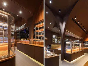 Modern cafe interior with wooden finishes and lighting