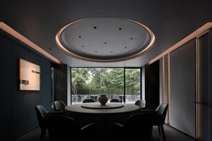 Modern dining room featuring metallic elements