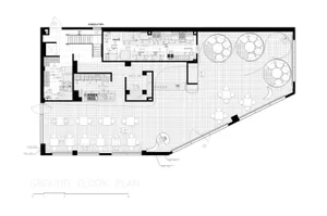 A detailed blueprint of a restaurant facility showing floor plan with various rooms and functional areas