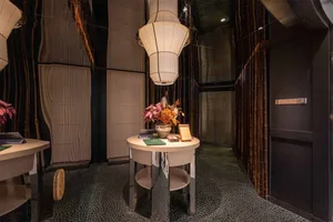 Modern interior design featuring bamboo elements in a hotel suite