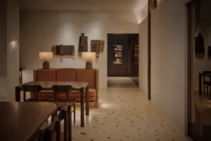 A modern living room with wooden furniture and leather seating.