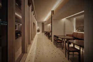 A modern restaurant interior with wooden and leather accents and a warm, inviting atmosphere.