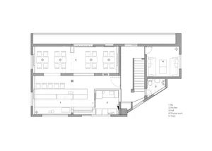 Floor plan of a modular office space showcasing lightweight construction materials and a minimalist design.
