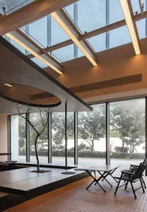 A modern home interior featuring wood and glass materials.