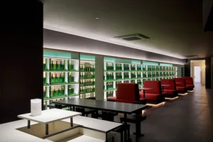 A modern restaurant with a glass counter.