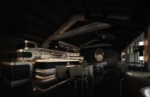 A dimly lit industrial restaurant bar with black decor and modern seating.