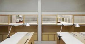 A modern office space featuring a wooden counter.