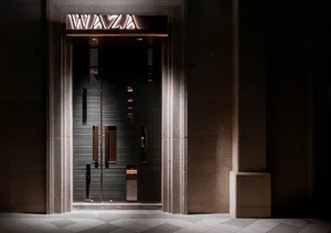 Modern storefront featuring metallic and glass elements.