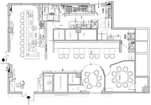 Black and white floor plan of a restaurant food court showing seating arrangements, food stations, and kitchen areas.