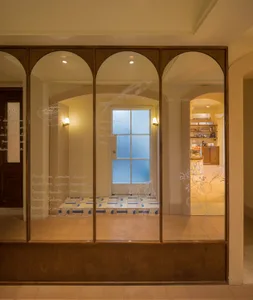 A modern retail storefront with a glass door.