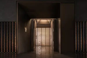 A luxurious lobby with a metallic grille design